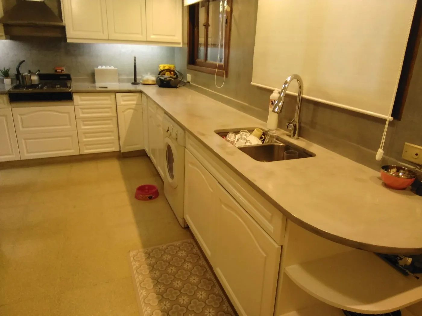 Suelo continuo de microcemento en loft moderno - Obra Fina